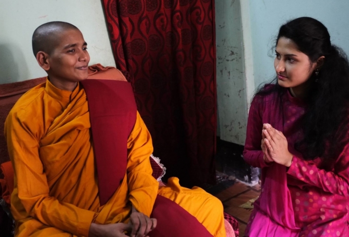Samaneri Gautami with a female devotee. From Sramoni Sangha, Facebook