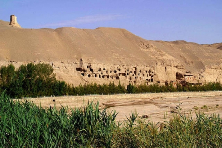 The Mogao Caves, on the edge of the Taklamakan Desert. Photo by Neville Agnew. Image courtesy of UNESCO World Heritage
