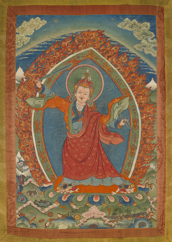 Guru Rinpoche in heroic pose with sword and dagger (phurba). Bhutanese thangka painting, 19th century. From Core of Culture