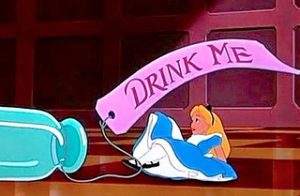 Alice drinks from the bottle marked “Drink Me.” Still from Walt Disney’s Alice in Wonderland (1951).