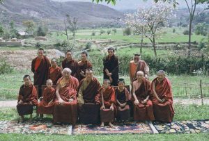 Dzongsar Khyentse Rinpoche (seated, fourth from right) with two of his teachers, Dilgo Khyentse Rinpoche (seated, third from left) and Khamtrul Rinpoche (seated, fourth from left), at the time of receiving the Dam Ngak Dzö empowerment from Dilgo Khyentse Rinpoche. Image courtesy of Siddhartha's Intent