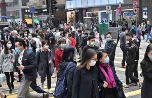 Workers wearing face masks in Hong Kong. From philstar.com