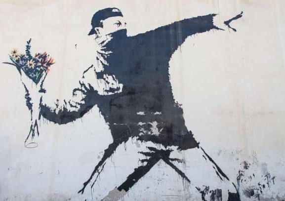 Rage, the Flower Thrower by Banksy, Jerusalem. From the8percent.com