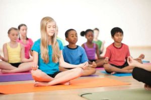 Children meditating. From genpsych.com