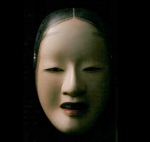 Noh mask, Zo Onna, 19th century. Sculptor unknown. Zo Onna signifies a beautiful, slightly older woman who has experienced tragedy and gained wisdom. It expresses a more composed and elegant figure than a younger woman. From Core of Culture