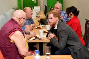 Prince Harry, right, with Buddhist monk Kelsang Sonam, left. From cosmopolitan.com