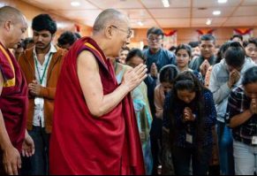 The Dalai Lama greets students. From dalailama.com