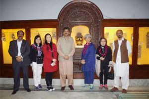 Members of the Chinese delegation and Pakistani officials at the Peshawar Museum. From facebook.com
