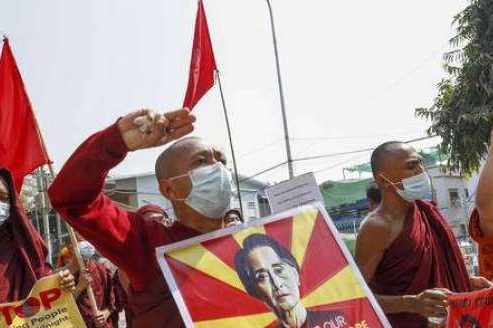 Buddhist monks and nuns protest in Mandalay on Tuesday. From triblive.com