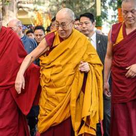 The Dalai Lama walks to the main temple of the Tsuglagkhang complex to attend an offering of prayers for his long life. Photo by Tenzin Choejor. From dalailama.com