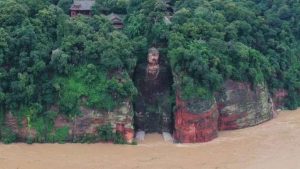 Images this week show the height of floodwater at the feet of the Leshan Giant Buddha. From bbc.com