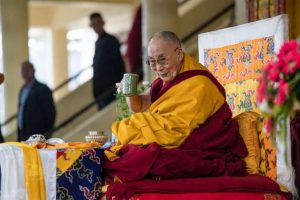 His Holiness the Dalai Lama enjoying a cup of tea before the start of the Monlam teachings in March 2nd, photo by Tenzin Choejor. From dalailama.com