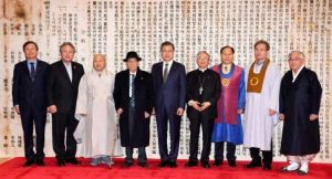 President Moon Jae-in, center, with the leaders of the seven largest religious groups in South Korea and Culture Minister Do Jong-hwan at the Blue House in Seoul on Monday. From koreajoongangdaily.com