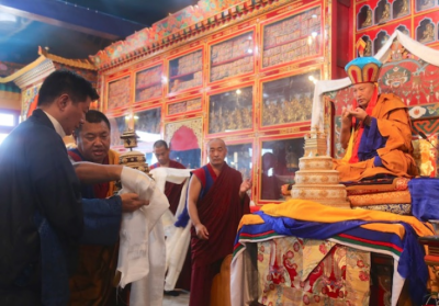 CTA president Dr. Lobsang Sangay makes an offering to the 34th Menri Trizin during the enthronement ceremony. From phayul.com