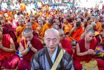 Buddhist monks of different traditions gather under the Bodhi tree in Bodh Gaya on the occasion of the birth anniversary of the Buddha. From outlookindia.com