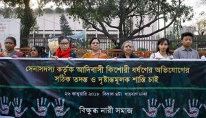 Women from a rights group demonstrate in Dhaka to protest the alleged assault of the two Marma sisters. From dhakatribune.com