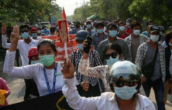 Demonstrators march during a pro-democracy protest in Mandalay on 18 April. From mizzima.com