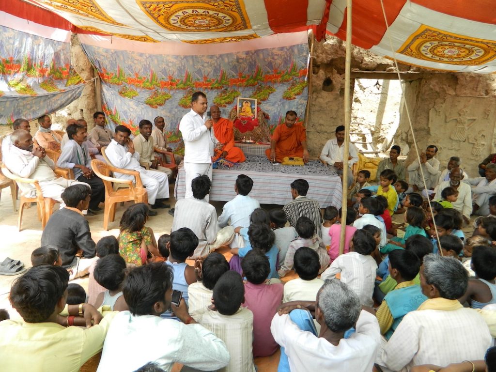 Bhikkhu Upanand and Suresh giving a Dhamma talk in Shahjahanpur District, Uttar Pradesh. Program organized by the YBS. From Bhikkhu Upanand