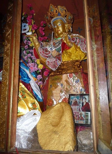 Statue of Yeshe Tsogyal with footprint relic. Photo by DYW