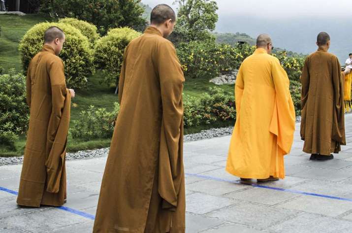 Monks at Tsz Shan Monastery in Hong Kong. Image courtesy of author