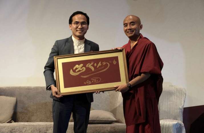 The author with Yongey Mingyur Rinpoche at the recent “Awareness Leadership Workshop” in Hong Kong. Image courtesy of Tergar Asia