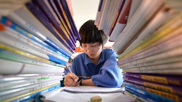 A student studying for the national college entrance exams in China. From scmp.com