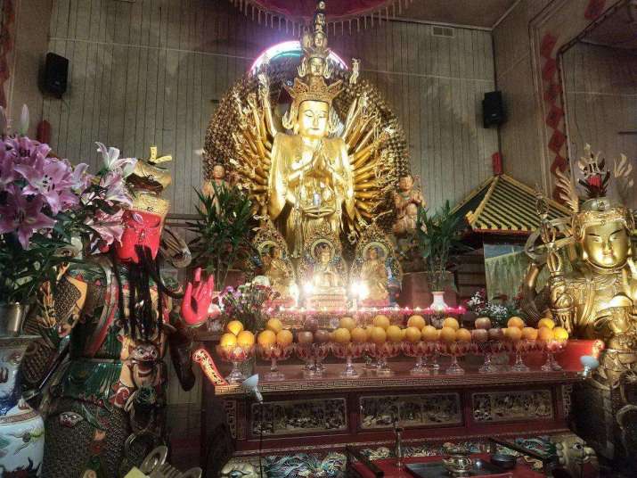 Thousands of visitors to the American Society of Buddhist Studies in Chinatown left offerings of incense and fruit. From nydailynews.com