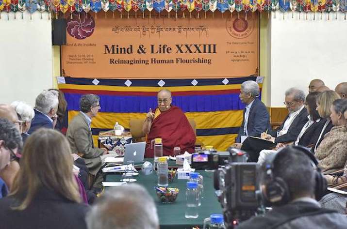 His Holiness, honorary chairman of the Mind & Life Institute, speaks with conference delegates. Photo by Tenzin Phende. From tibet.net