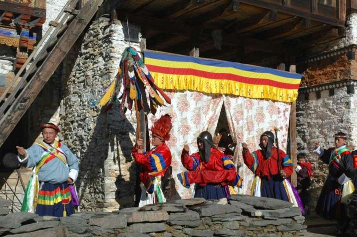Martial zhey dance training at Ngangbi Rabney, day three, Bhutan, 2006. These dances are performed by descendants of families who formed the militias that protected Bhutan in its earliest days in the beginning of the 17th century. Photo by Gerard Hougton. From Core of Culture