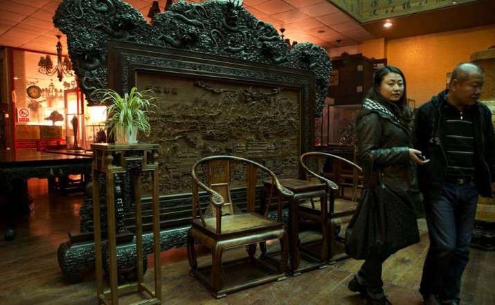 A furniture shop in Beijing sells chairs made from Vietnamese rosewood. From asiancorrespondent.com
