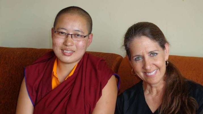 Kathryn LaFever and a Buddhist nun in Kathmandu. Image courtesy of Kathryn LaFever