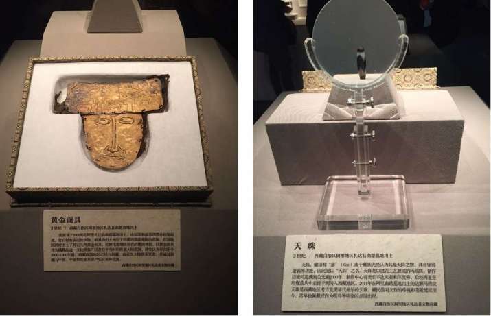 Gold mask, left, and a <i>gzi</i> bead, right, Zhang Zhung culture, third century. Photos by the author