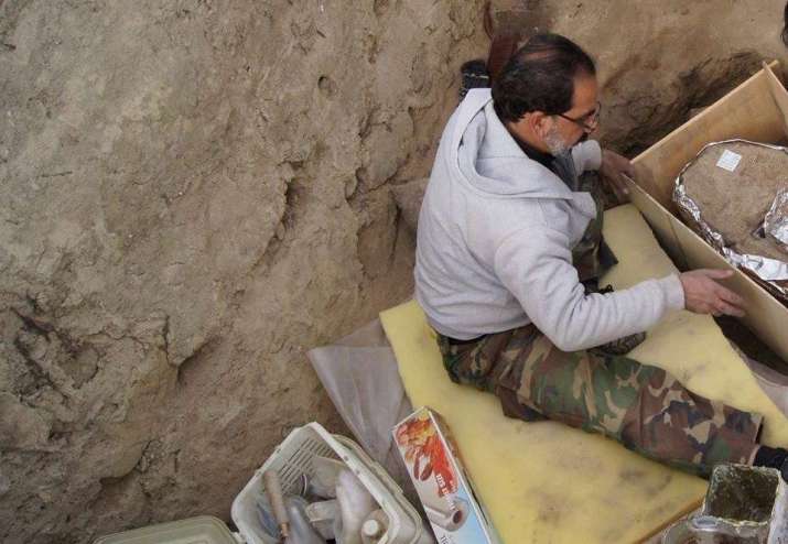 Archaeologist Abdul Wahab Ferozi working at Mes Aynak. From Saving Mes Aynak Facebook