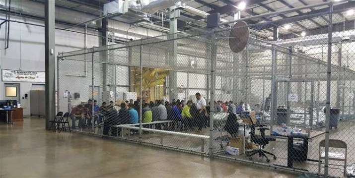 People taken into custody related to cases of illegal entry into the US sit in a cage at McAllen Immigrant Center in Texas. From nbcnews.com