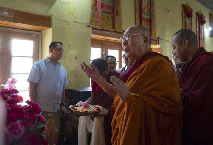 His Holiness pays his respects before a statue of Guru Rinpoche inside the Leh Jokhang on Wednesday. Photo by Tenzin Choejor. From dalailama.com