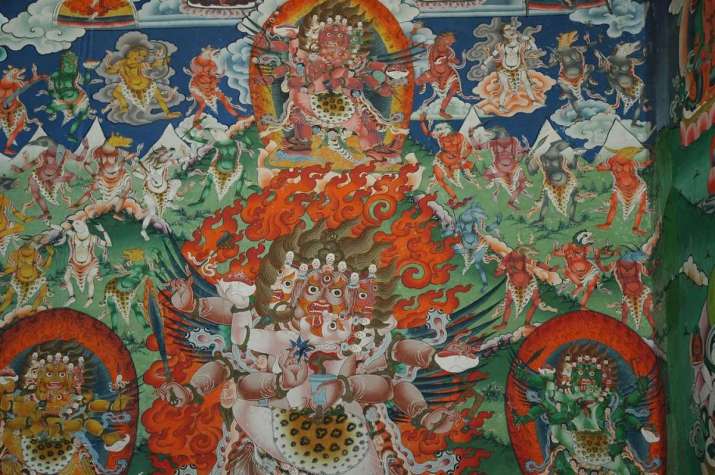 A visionary mural. Ferocious protective deities with dancing animal-headed <i>khandum</i> appear in their dimension in the sky and above the ground. Bumthang, Bhutan, 2006. Photo by Gerard Houghton. From Core of Culture.