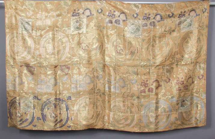 Buddhist monk’s mantle (<i>kesa</i>) with phoenix roundels and pawlonia leaves. Japan, 1850–1900. Patched silk brocade, 116.84cm x 196.85cm. Collection of Scripps College, Claremont. Image courtesy of Scripps College