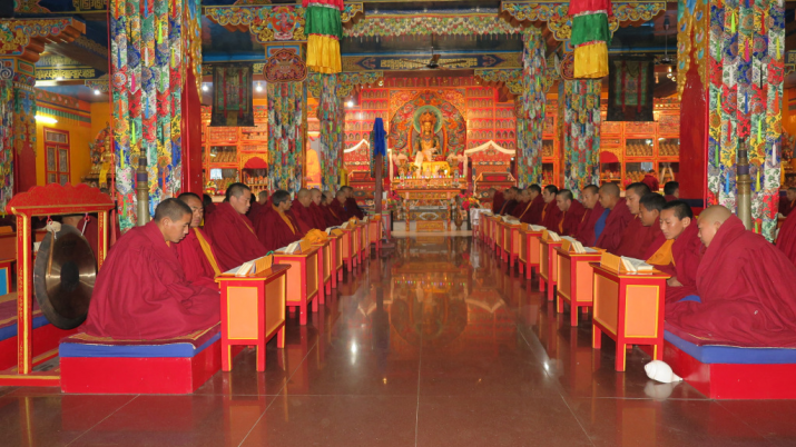 Yungdrung Bön monks pray in the main temple of Menri Monastery during the Lha Sung Den Terwa. From ravencypresswood.com