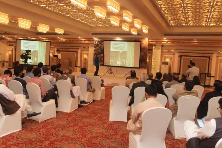 Participants of the seminar watch a presentation. From pakistantoday.com.pk