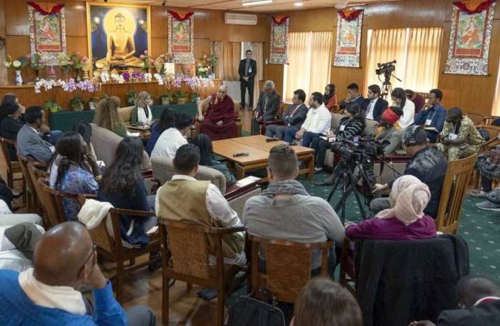 Thee Dalai Lama hears presentations from the USIP youth leaders. From dalailama.com