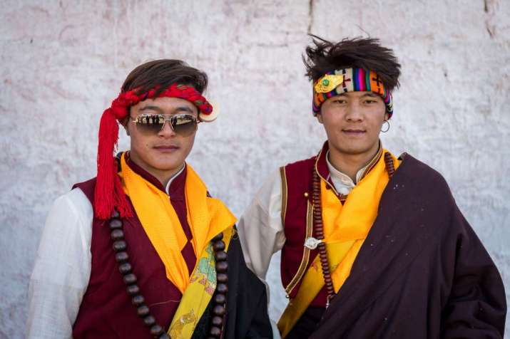 2018. Gormang Monastery in Aba Tibetan Autonomous County, Sichuan Province. Two adult ceremonial horsemen.