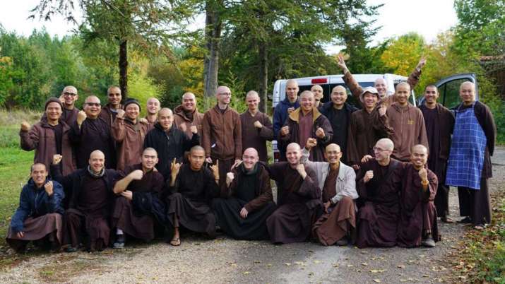 The first nine monks of the 12 who will eventually take residence at the new center say goodbye to their brothers before moving to Healing Spring Monastery. From healingspringmonastery.org