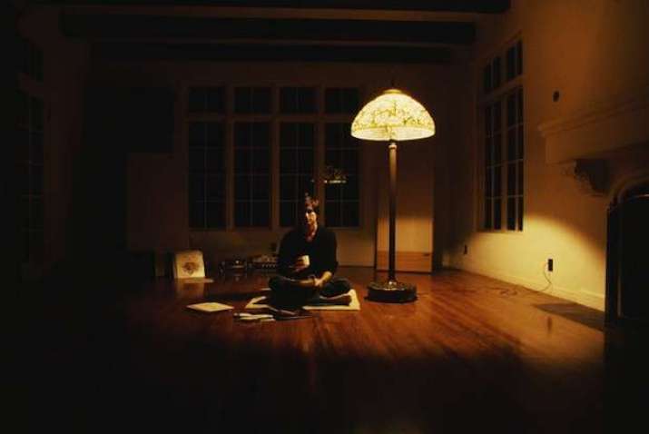 Steve Jobs drinking tea on the floor. From cultofmac.com