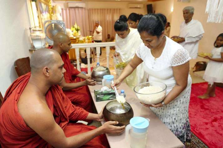 Volunteers serve food to the monks, of whom two are in the UAE at a given time. From thenational.ae