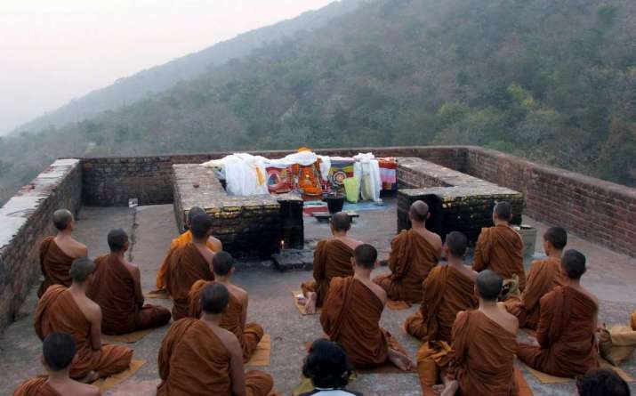Monks assemble on Vulture Peak in Bihar, India. From blog.oup.com