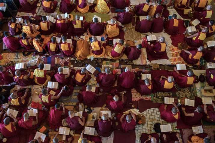 Monks assemble in the main hall of Tashi Lhunpo monastic university for teachings. From tashihunpo.org