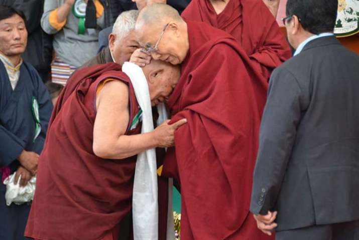 Yeshi Dhondhen with His Holiness the Dalai Lama. From tibetpost.net