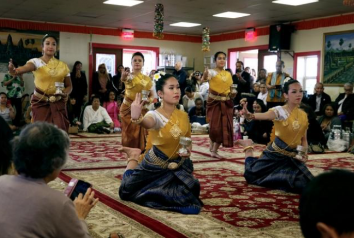 Members of the Nearyroth Academy of Arts perform the Flower Blessing Dance at Dhamagosnaram Buddhist Temple. From providencejournal.com