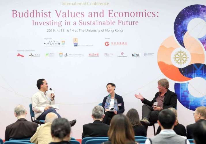 The author, left, at the Buddhist Values and Economics: Investing in a Sustainable Future conference. Image courtesy of Centre of Buddhist Studies, The University of Hong Kong
