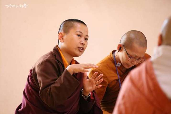 Namgyel Lhamo, a nun from Bhutan, during a group discussion. Image courtesy of Jungto Society